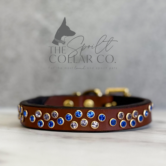 The Spoilt Collar Co
SMALL WAVE DESIGN CONKER LEATHER COLLAR WITH SMALL SAPPHIRE AND TANZANITE CRYSTALS 23.5CM-29.5CM